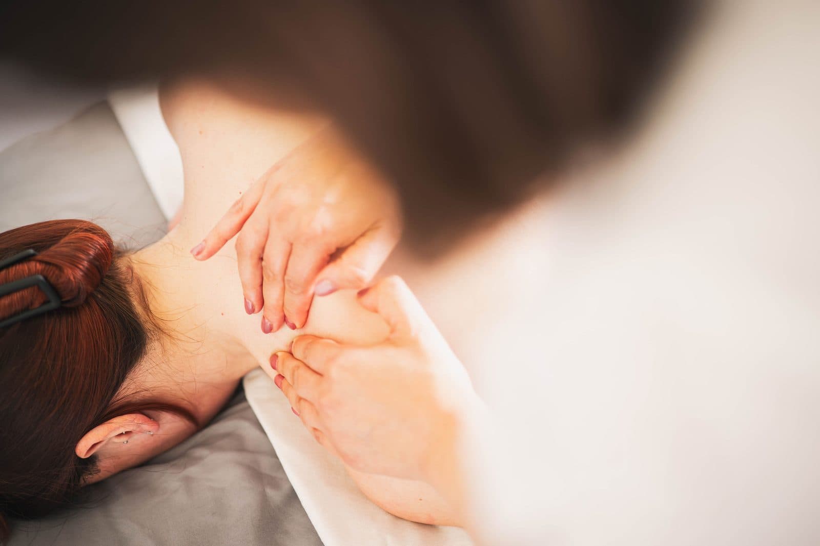 Gentle neck and shoulder work during a Trauma Release Massage