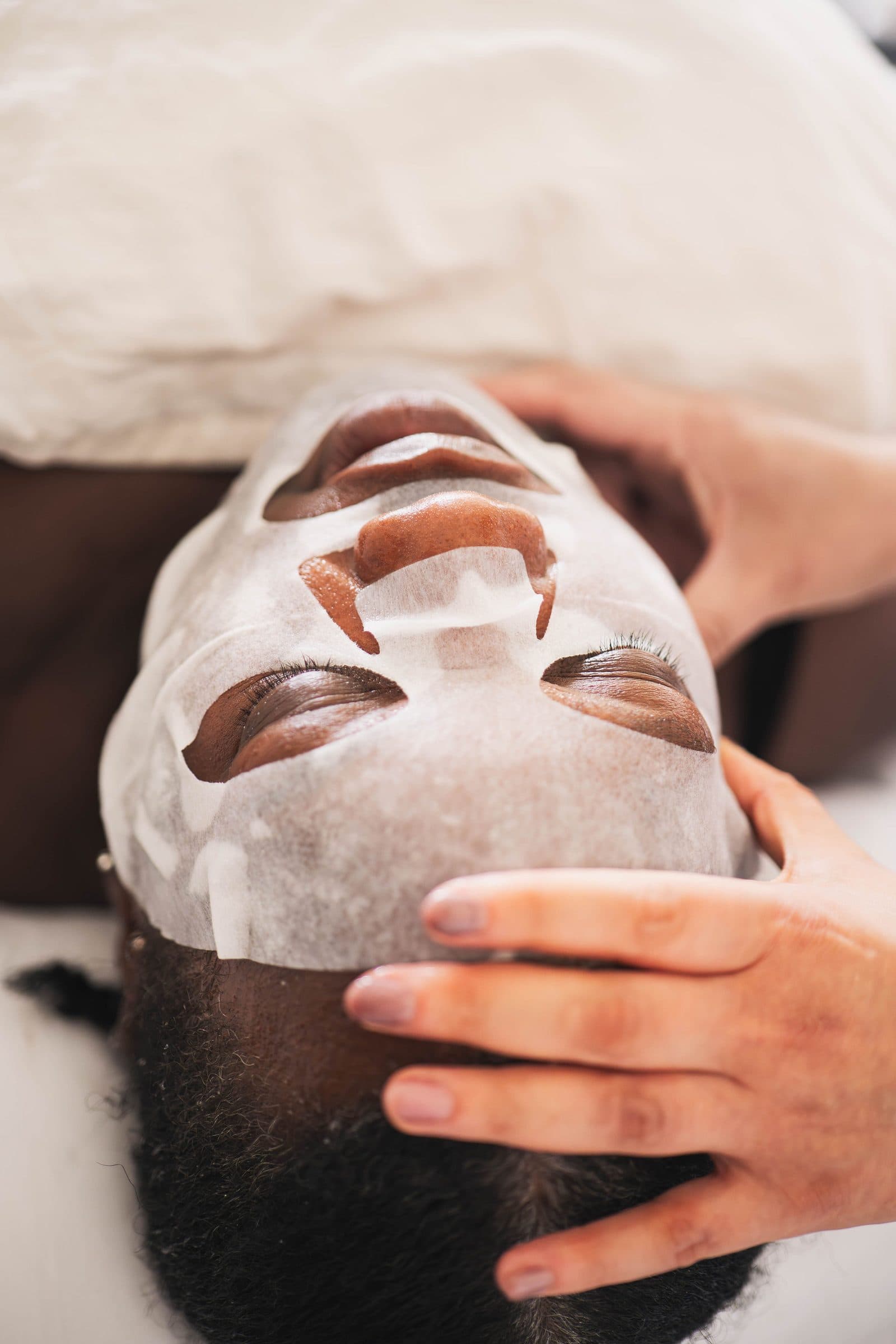 A nourishing sheet mask applied during a facial