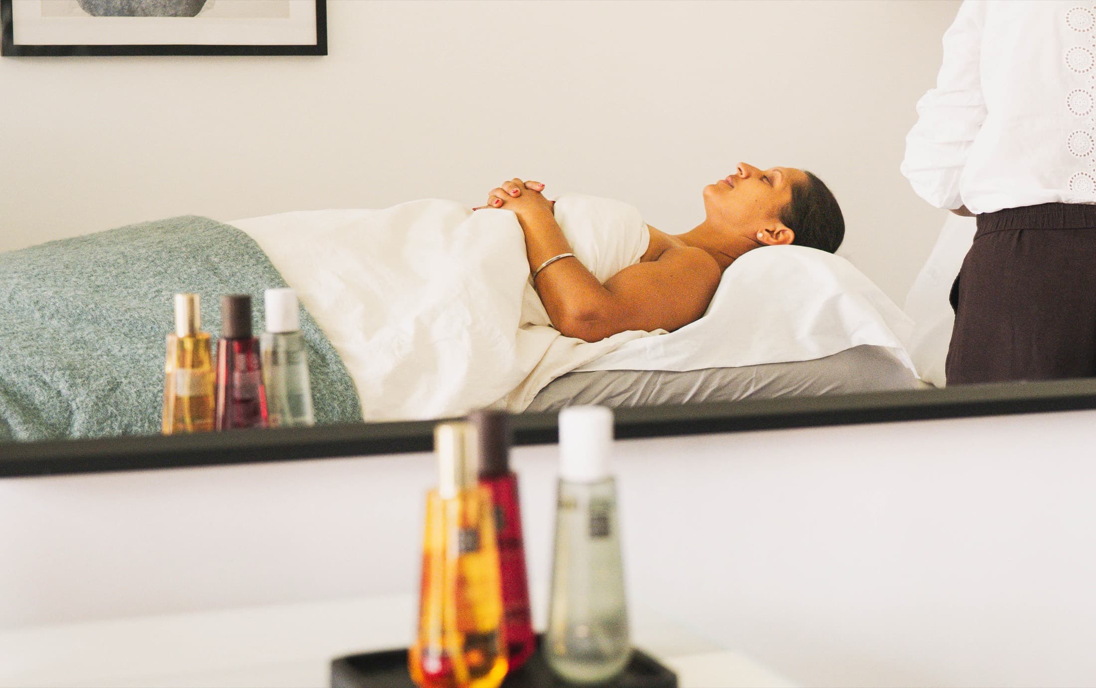 A client resting during a restorative treatment at Relax Revive Beauty in Woburn, Bedfordshire
